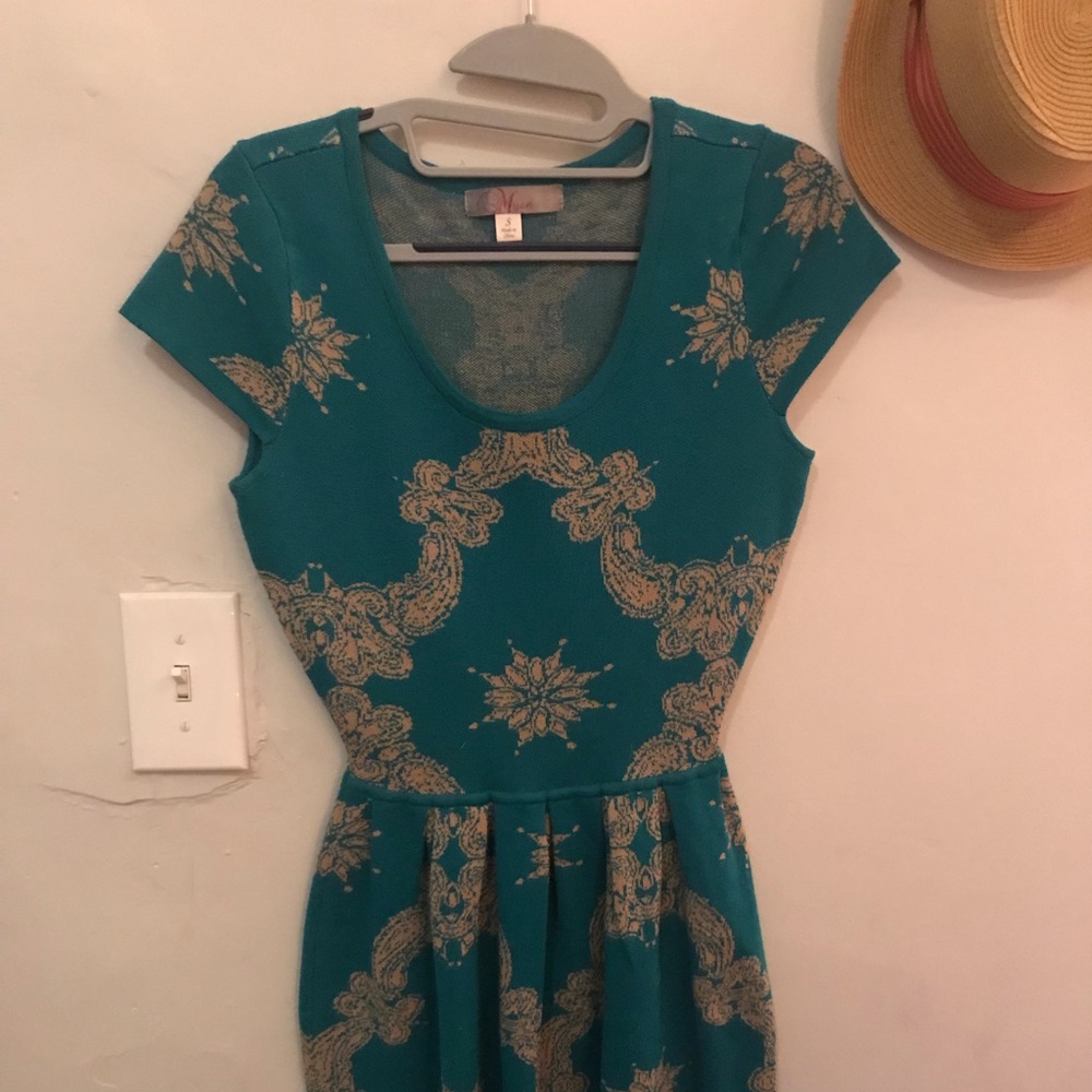 Turquoise sweater dress with snowflake design